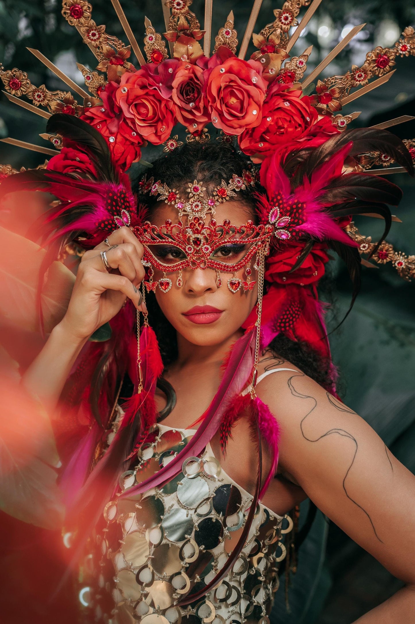 Red Carnival face mask and gold halo crown with roses