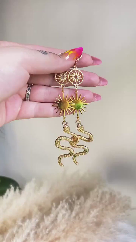 Load and play video in Gallery viewer, Celestial Earrings, Festival Earrings, Gold Earrings, Green Snake Earrings, Summer Earrings, Sun Earrings, Snake Jewellery, Boho
